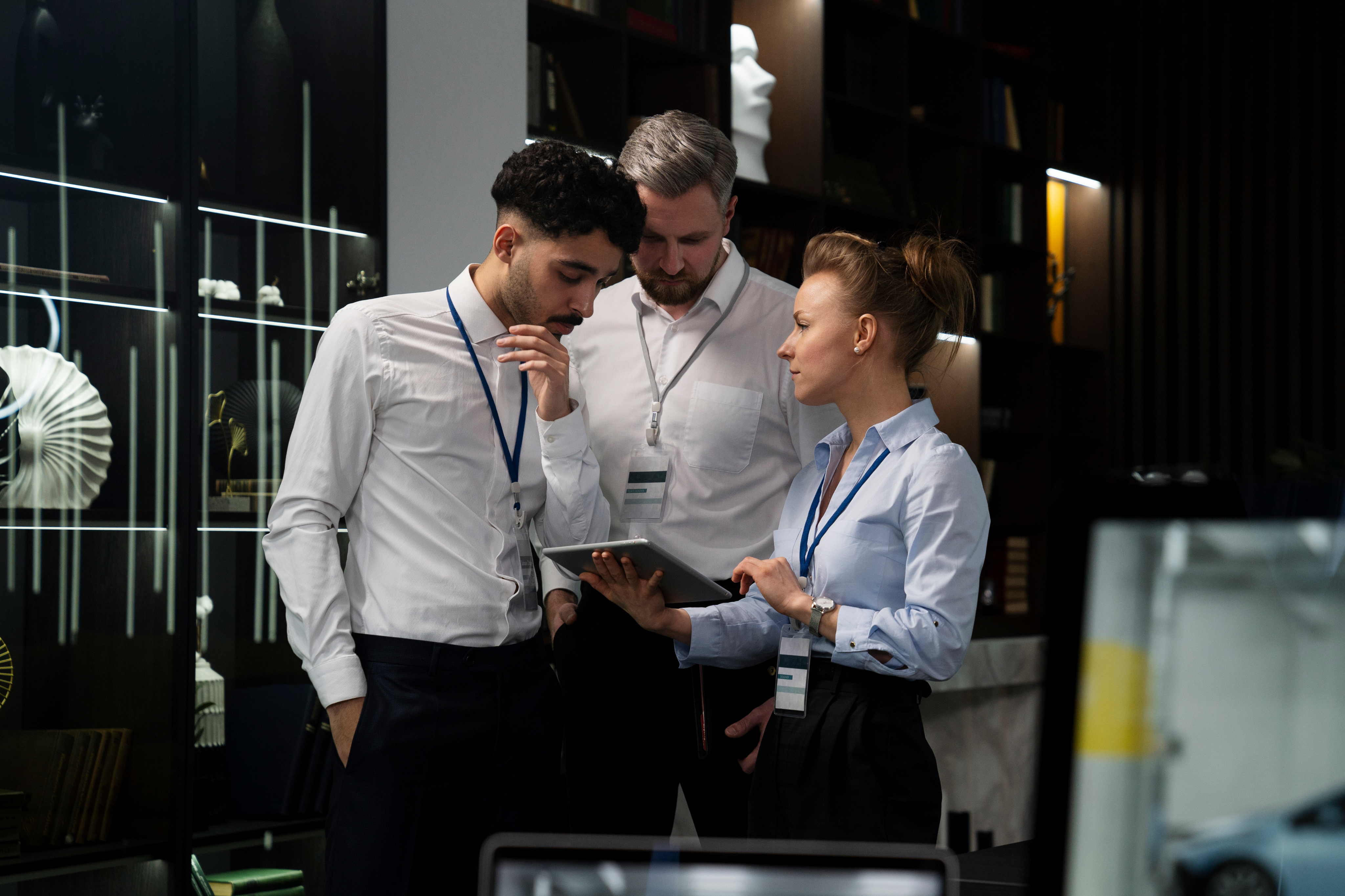 Team collaborating with a tablet
