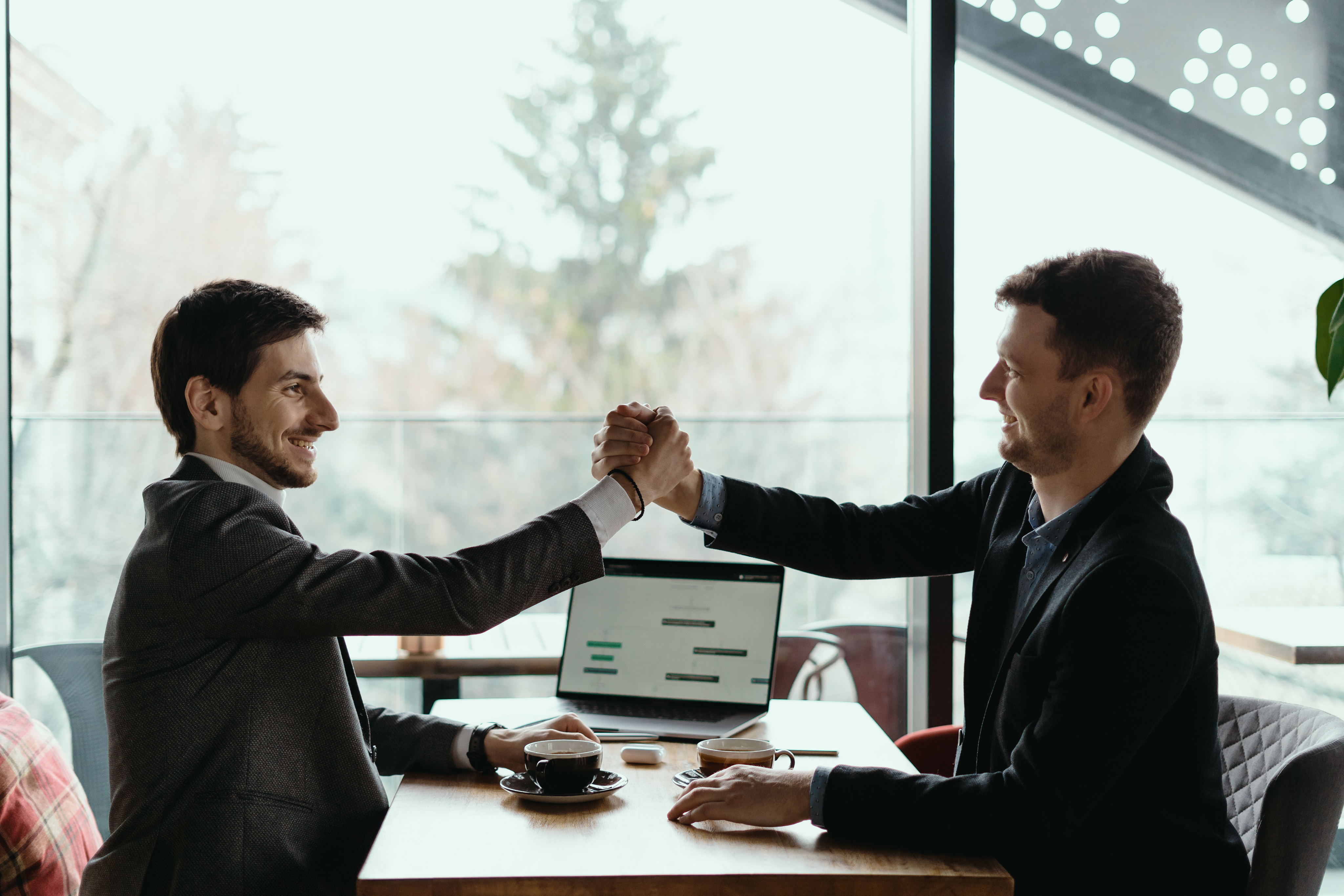 Business partners giving a high five